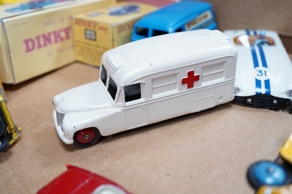 Twenty-seven Dinky Toys, all well-restored and fully repainted examples, fifteen with reproduction boxes, including; AA Mini van, Trojan van, Humber Hawk, Wayne school bus, A.C. Aceca, Austin Atlantic, Sunbeam Alpine, et